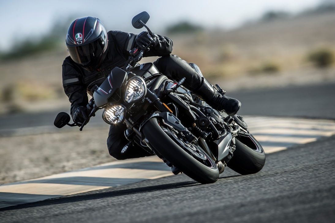 Speed Triple Corning on a track