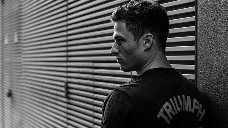 Male model wearing Triumph rider wear from the SS20 collection