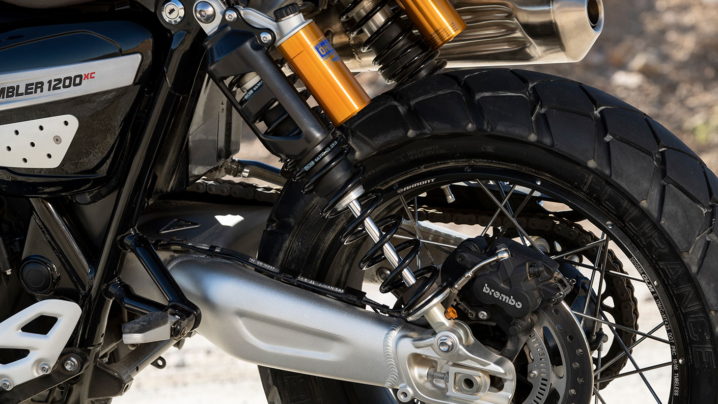 Triumph Scrambler 1200 XC adjustable rear suspension unit with brembo brakes and ohlins suspension also featured