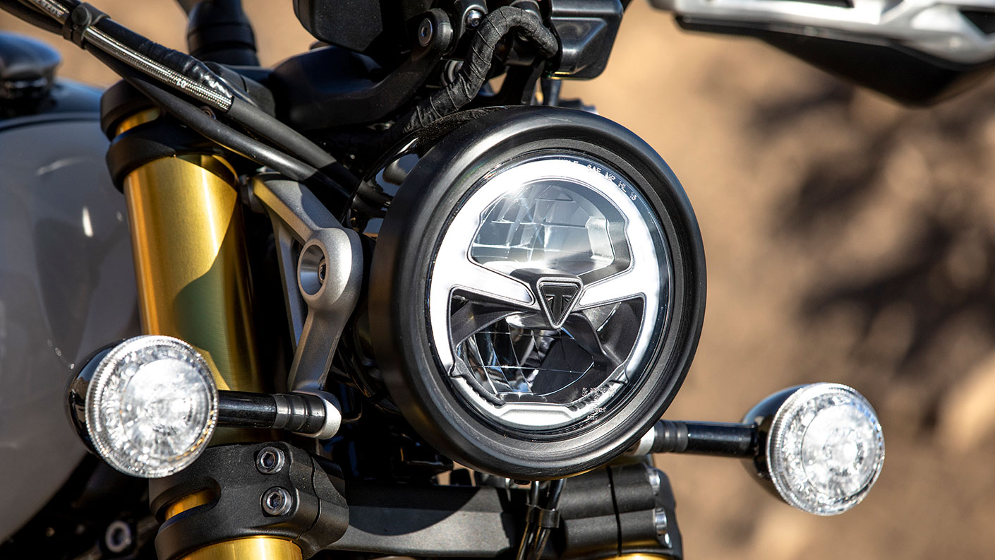 Triumph Scrambler 1200 LED headlight, with distinctive gold cartridge forks behind