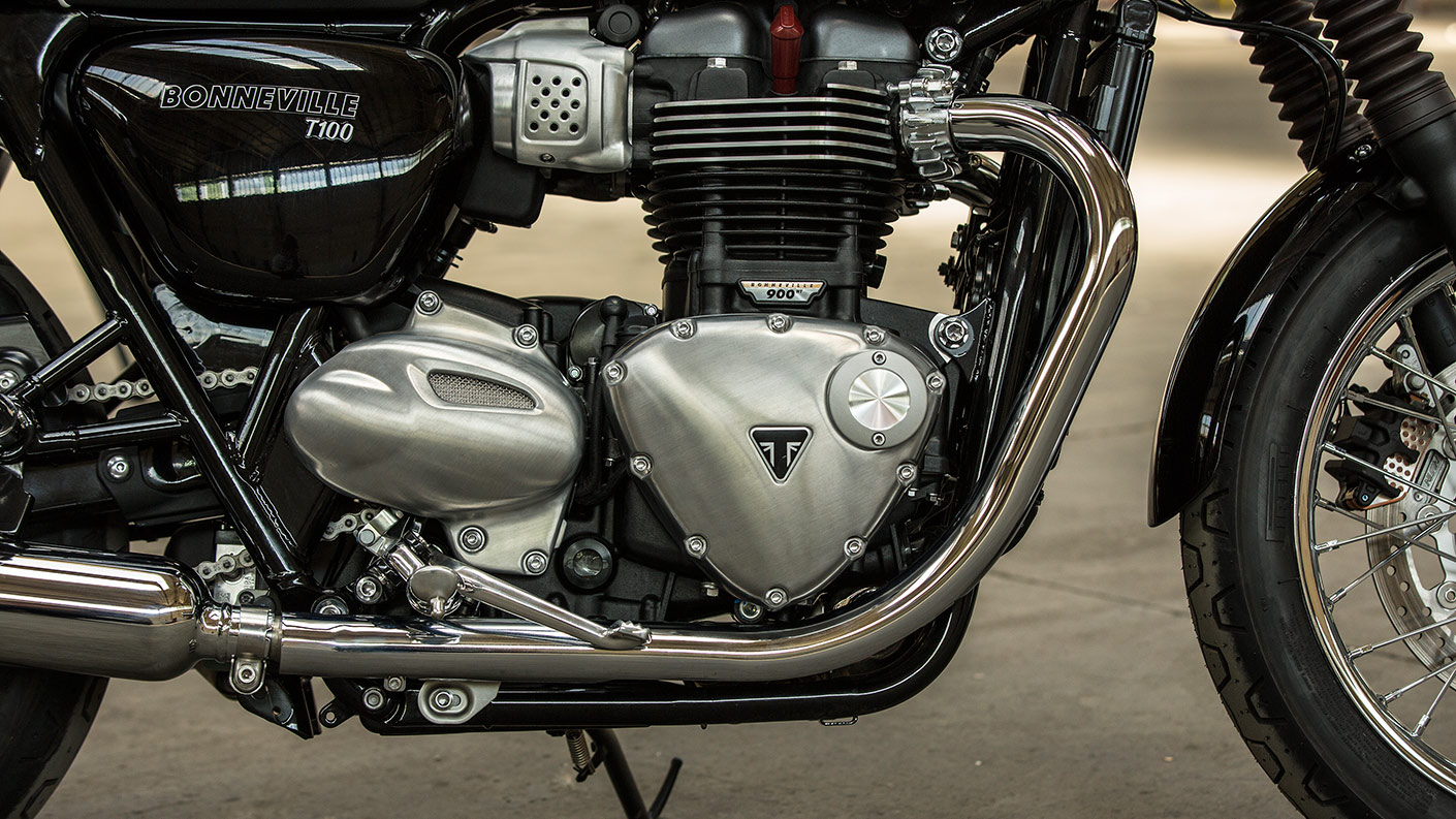 A close up shot of Triumph Bonneville T100s liquid cooling system