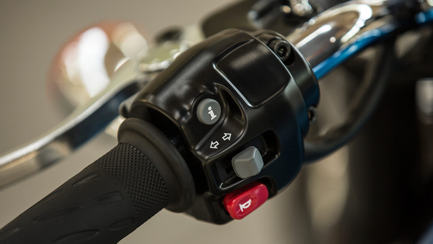 A close up shot of Triumph Bonneville T100s traction control system