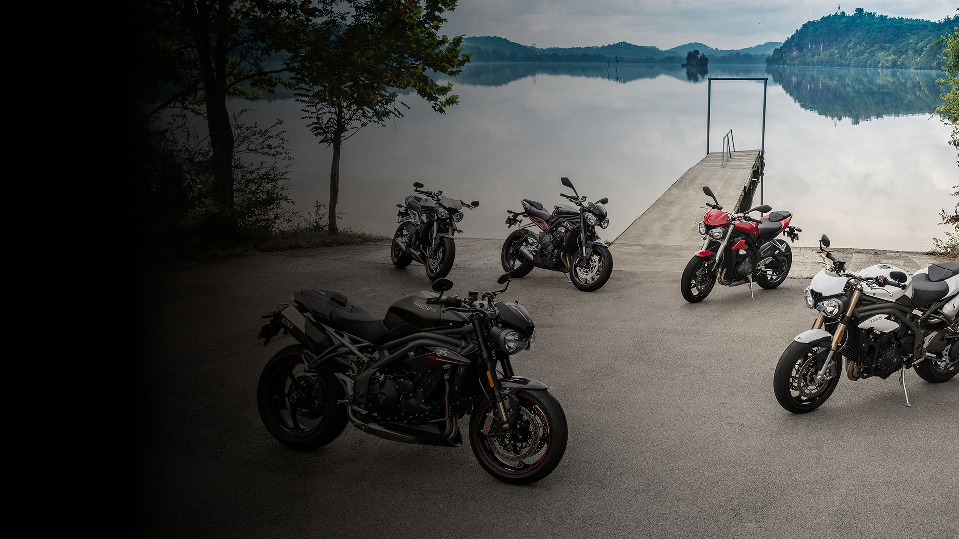 Triumph Roadsters Group Shot with dark gradient coming in from left hand bottom